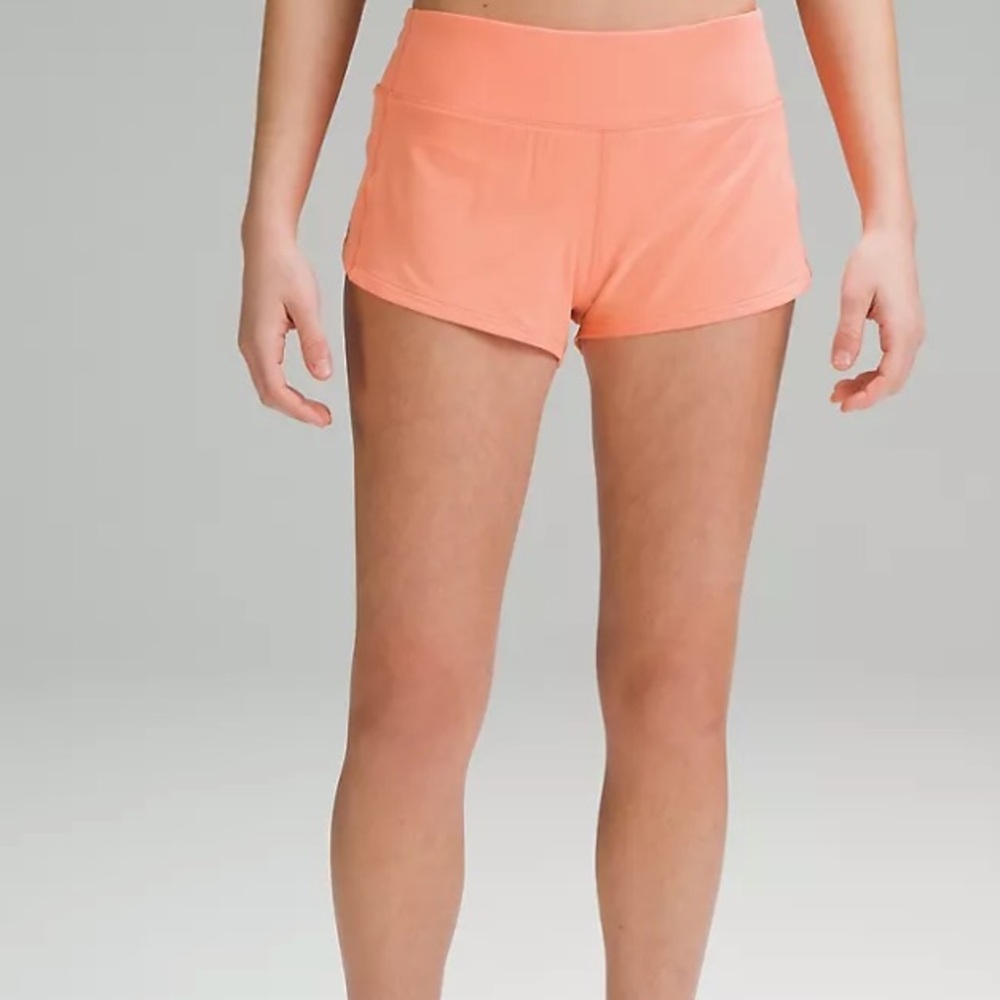 Speed up low rise Lululemon shorts in sunny coral
